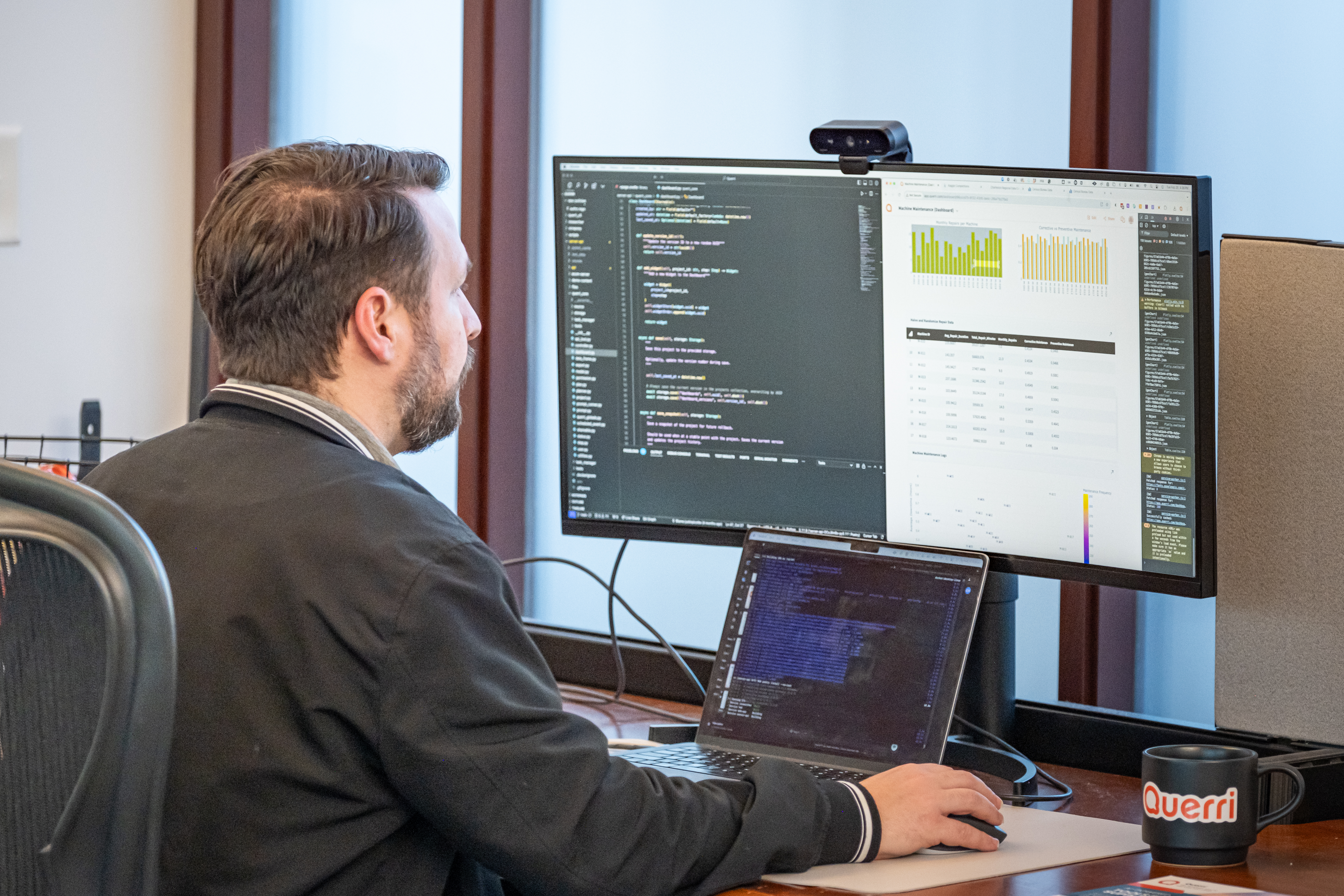 Dave Ingram, CEO of Querri, sitting at a computer